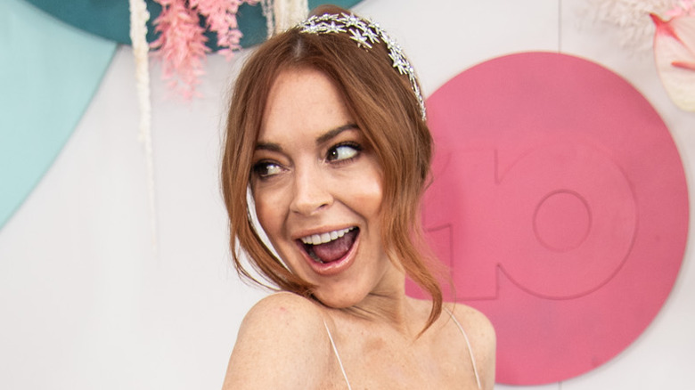 Lindsay Lohan red hair silver headband smiling