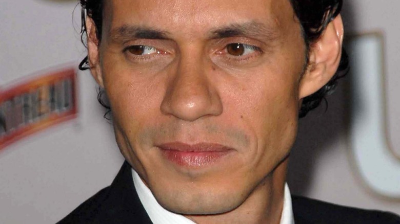 Marc Anthony with a neutral expression
