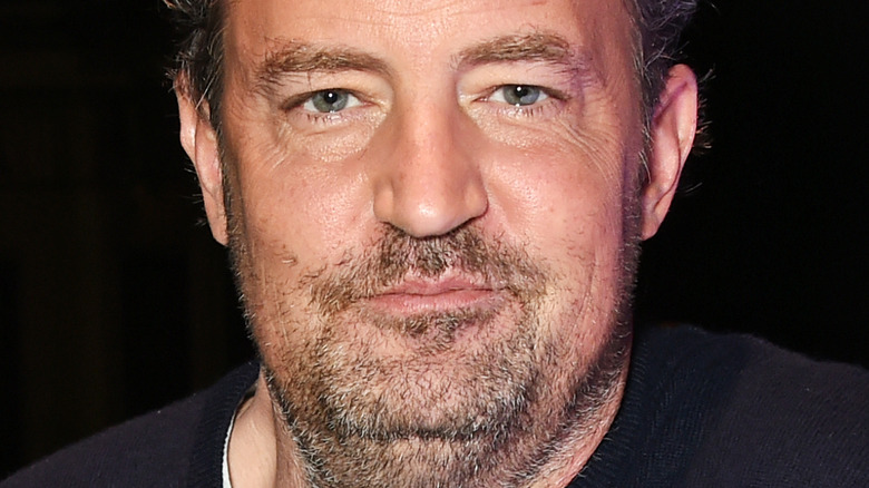 Matthew Perry looking into the camera