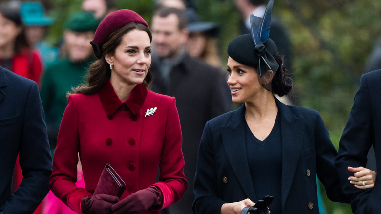 Kate Middleton and Meghan Markle walking