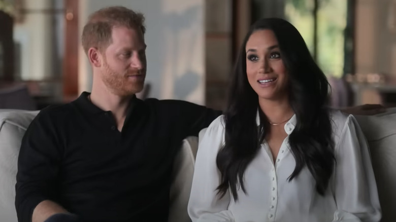 Prince Harry and Meghan Markle sitting