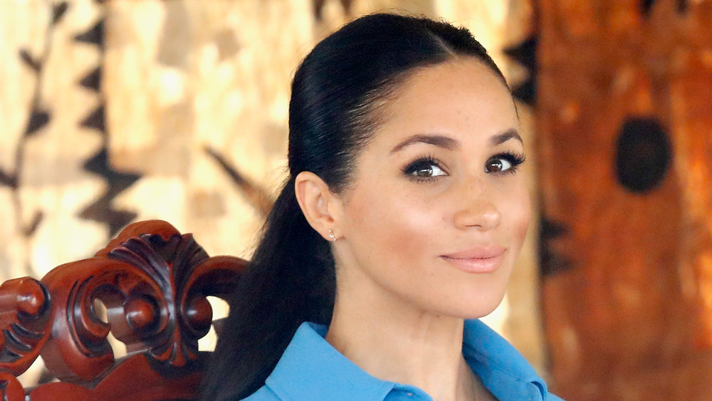 Meghan Markle glowing skin smiling