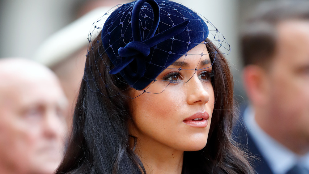 Meghan Markle staring