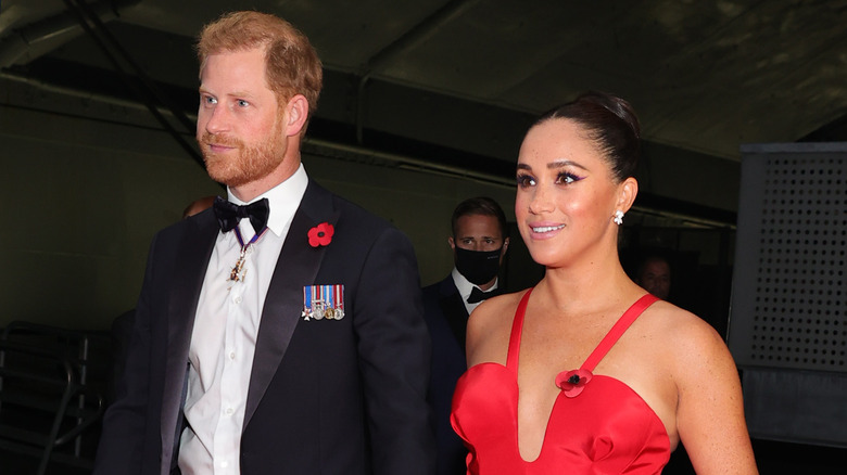 Prince Harry and Meghan Markle walking