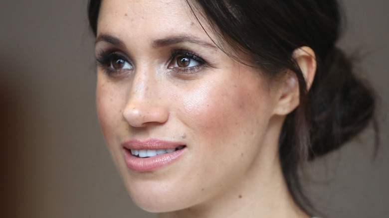 Meghan Markle looking up