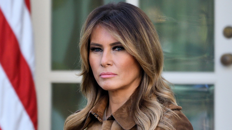 Melania Trump staring at a turkey named Butter