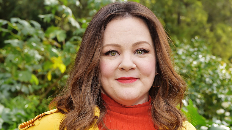 Melissa McCarthy smiling in close-up outdoors
