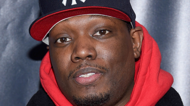 Michael Che looking at the camera