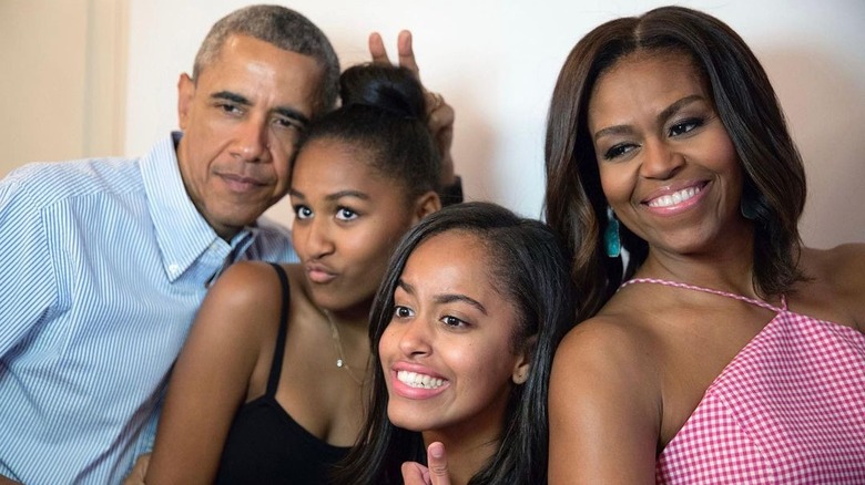 The Obamas posing for a photo