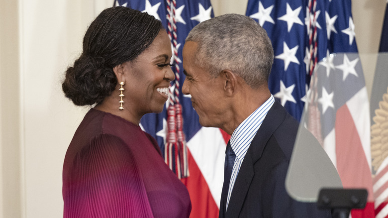 Michelle and Barack Obama smiling