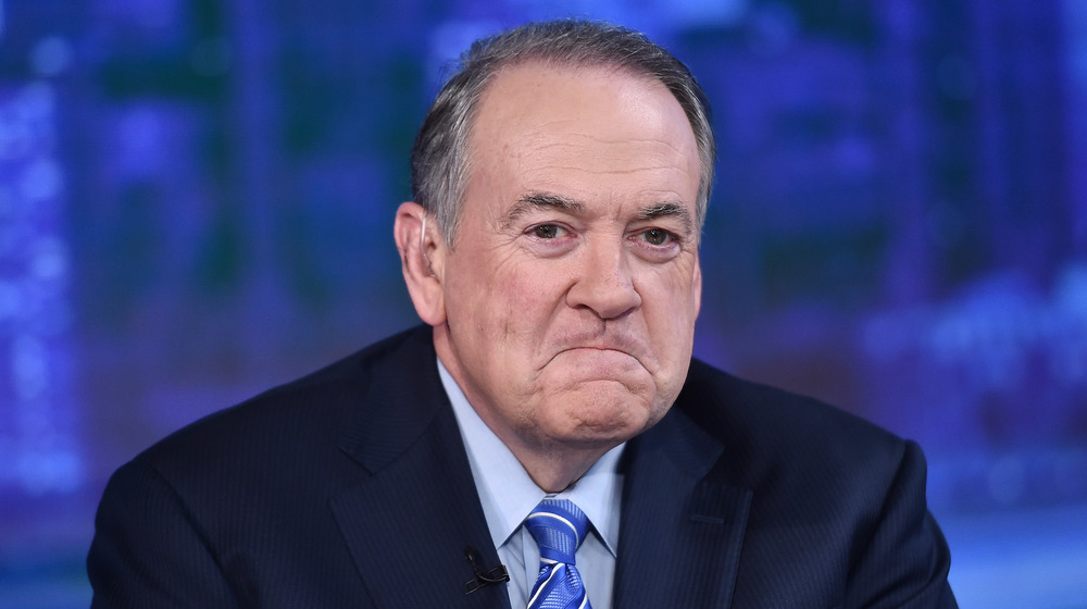 Mike Huckabee smile-frowning