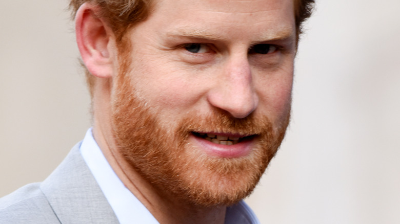 Prince Harry looking at the cameras