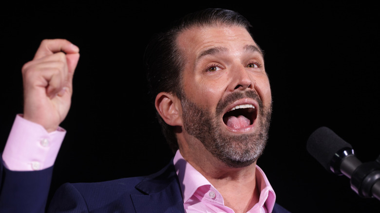 Donald Trump Jr. making exaggerated smile while speaking