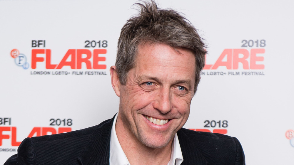 Hugh Grant smiling