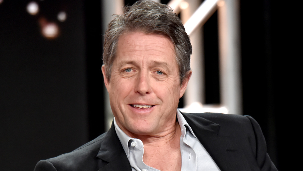 Hugh Grant smiling