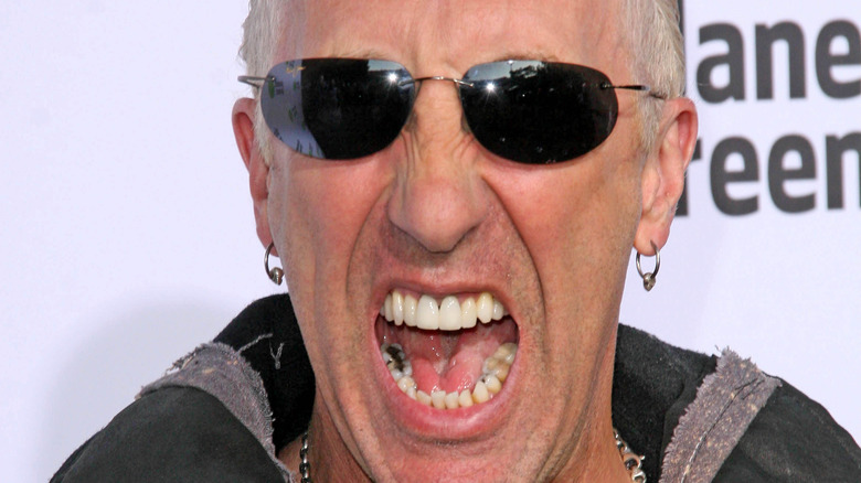 Dee Snider at event yelling sunglasses