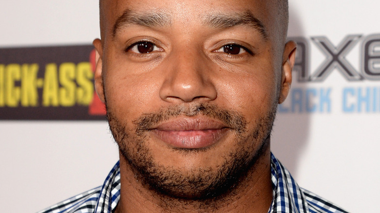 Donald Faison slightly smiling