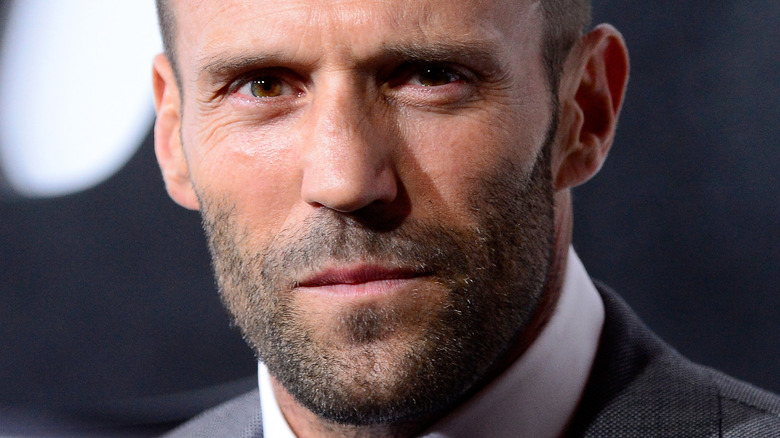 Jason Statham smirking red carpet