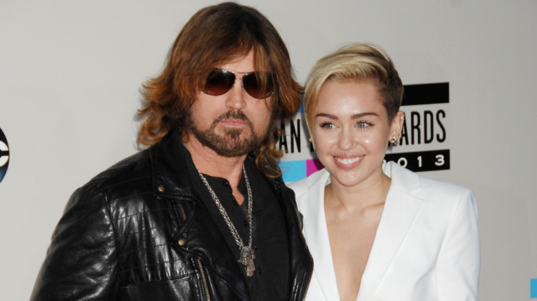 Miley Cyrus and Billy Ray Cyrus on the red carpet