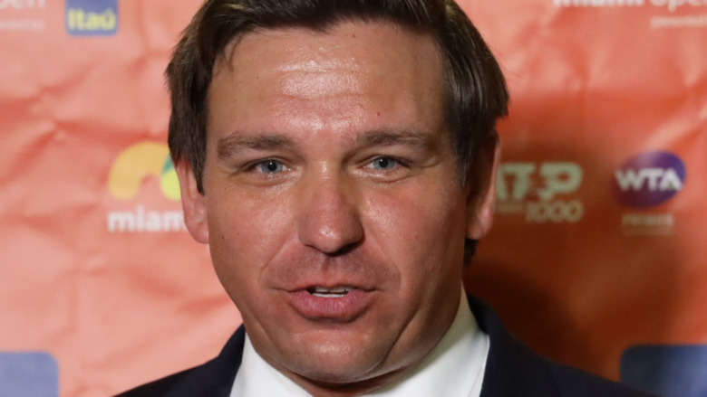 Ron DeSantis in conversation at an event