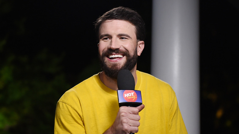 Sam Hunt smiling at an event