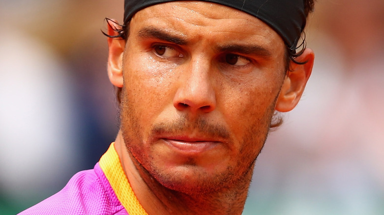 Rafael Nadal playing tennis