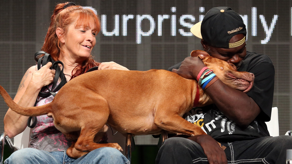 Tia Torres introducing someone to a dog