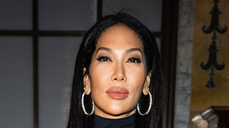 Kimora Lee Simmons posing