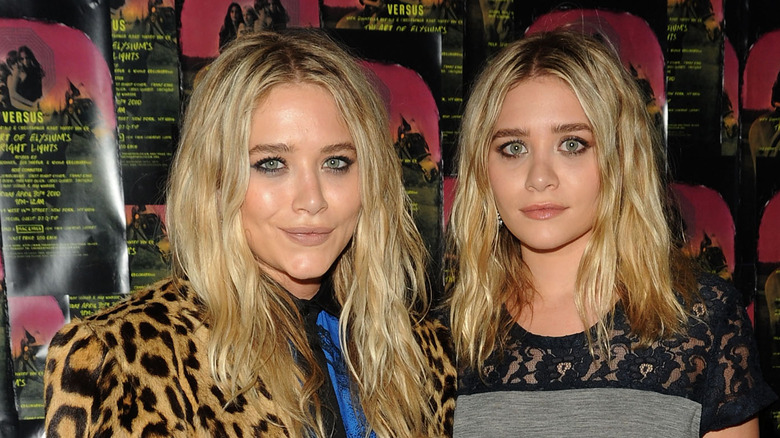 Mary-Kate and Ashley Olsen smiling 