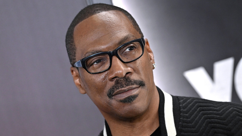 Eddie Murphy black glasses goatee