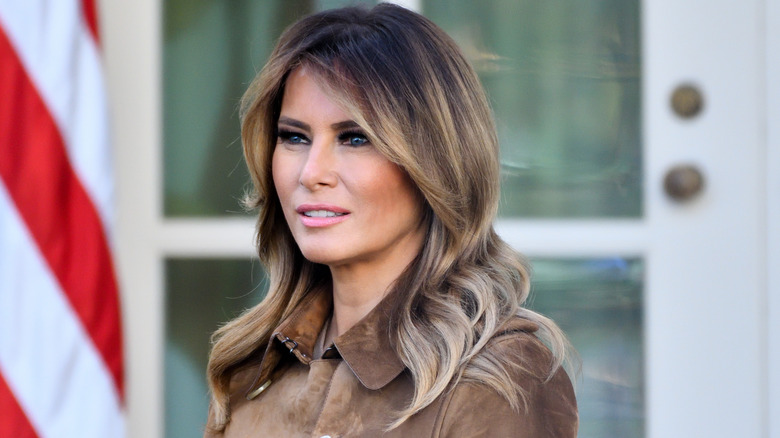 Melania Trump in a brown jacket