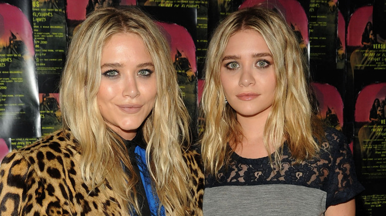 Mary-Kate and Ashley Olsen smiling