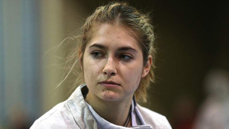 Monica Aksamit stares sideways