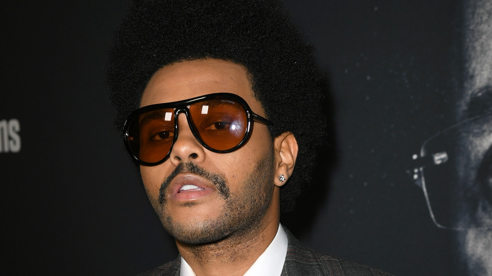 The Weeknd wears sunglasses at the 'Uncut Gems' premiere