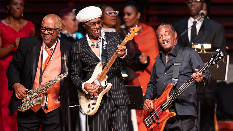 Dennis Thomas and members of Kool & the Gang on stage 