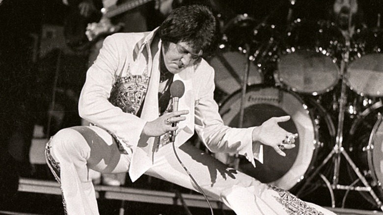 Elvis Presley in white jumpsuit