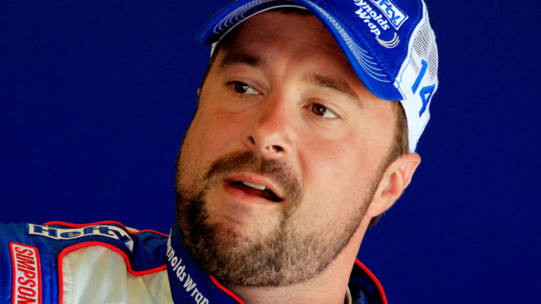 Eric McClure speaking at a race