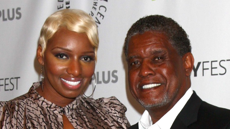 NeNe and Gregg Leakes smiling at an event
