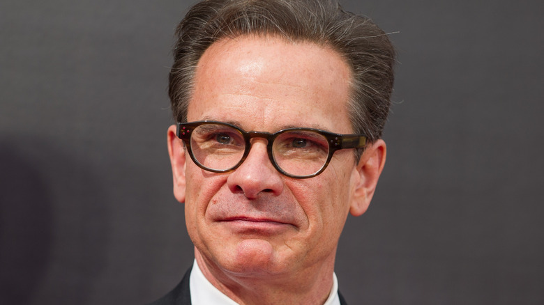 Peter Scolari smiles on the red carpet