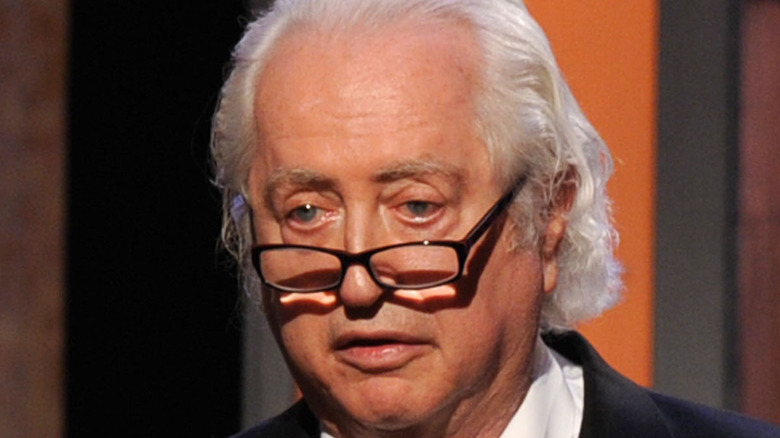 Robert Downey Sr. wears glasses on stage