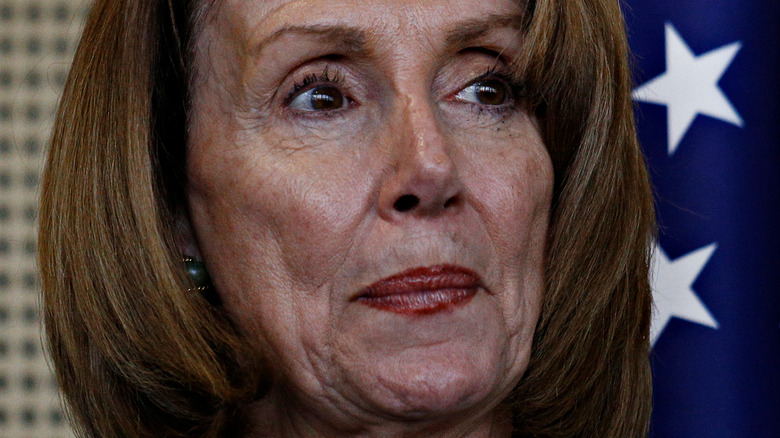 Nancy Pelosi looking away