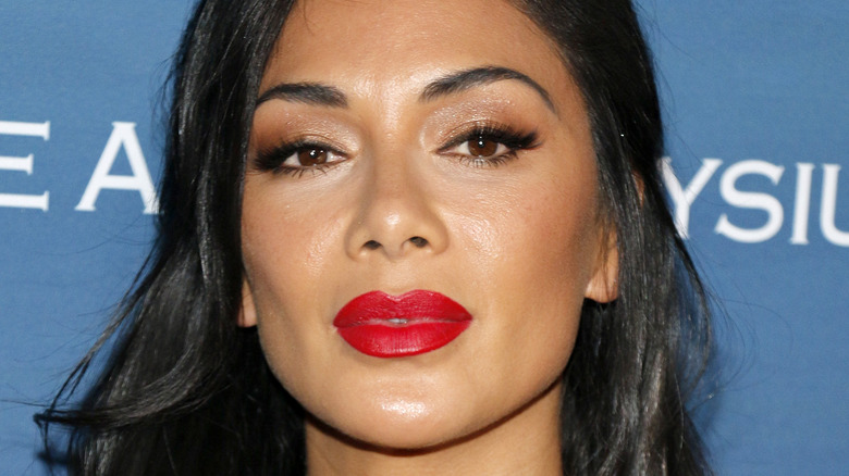 Nicole Scherzinger wears red lipstick