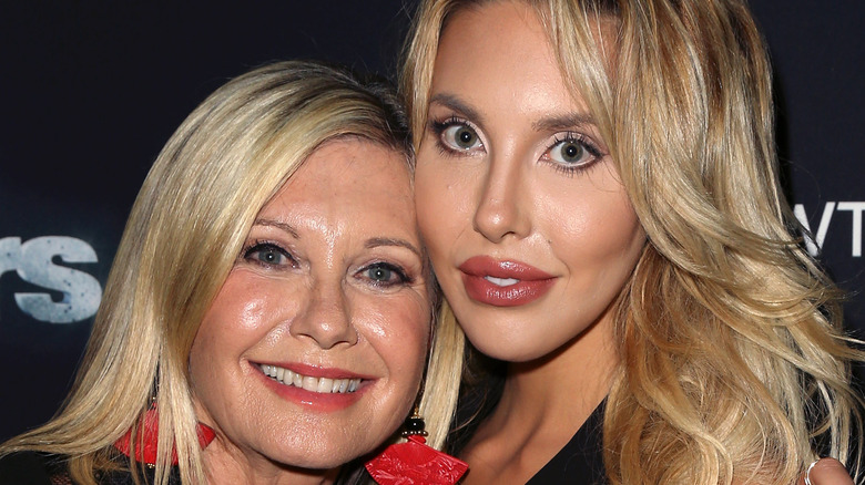 Olivia Newton-John and Chloe Lattanzi hugging