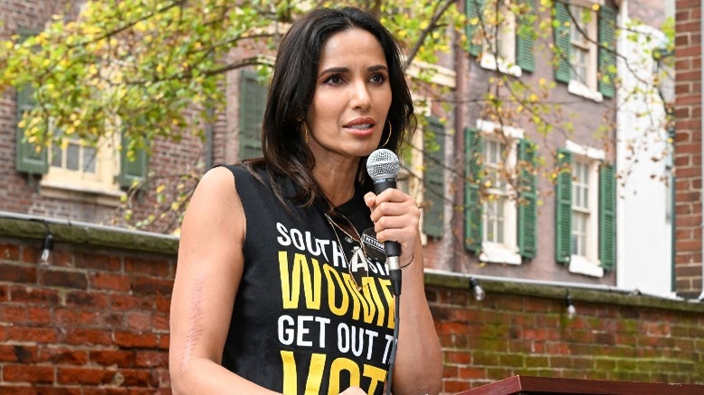 Padma Lakshmi holding a mic