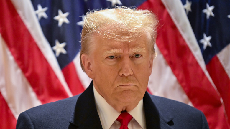 Donald J. Trump speaking at a press conference