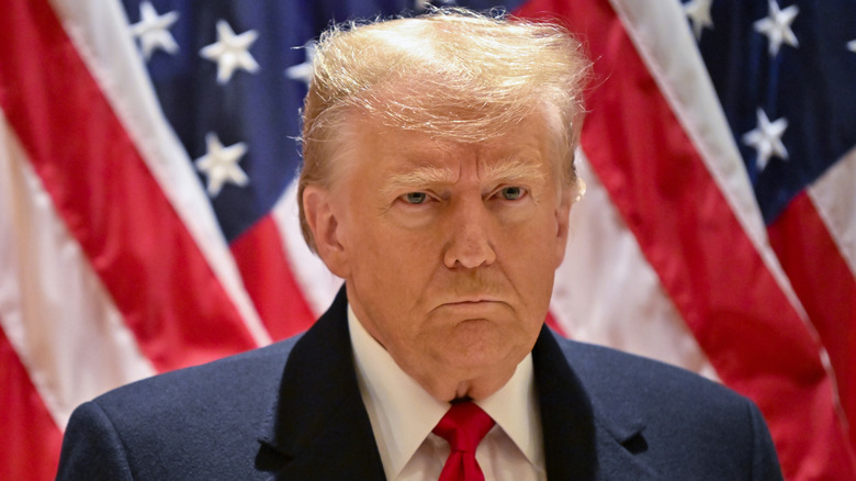 Donald J. Trump speaking at a press conference