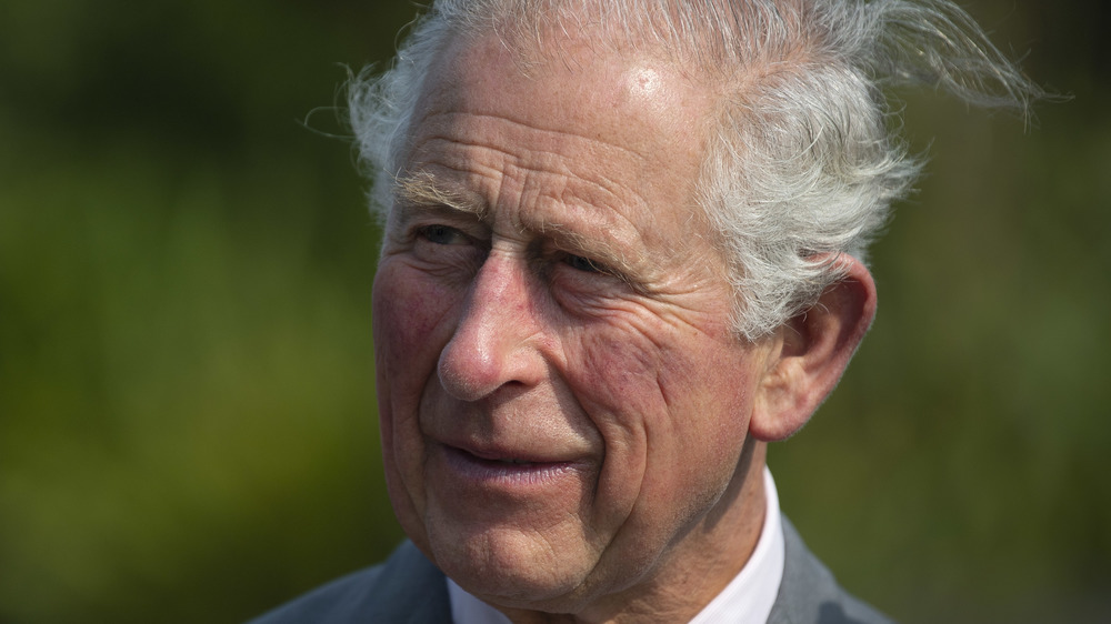 Prince Charles standing at an event 