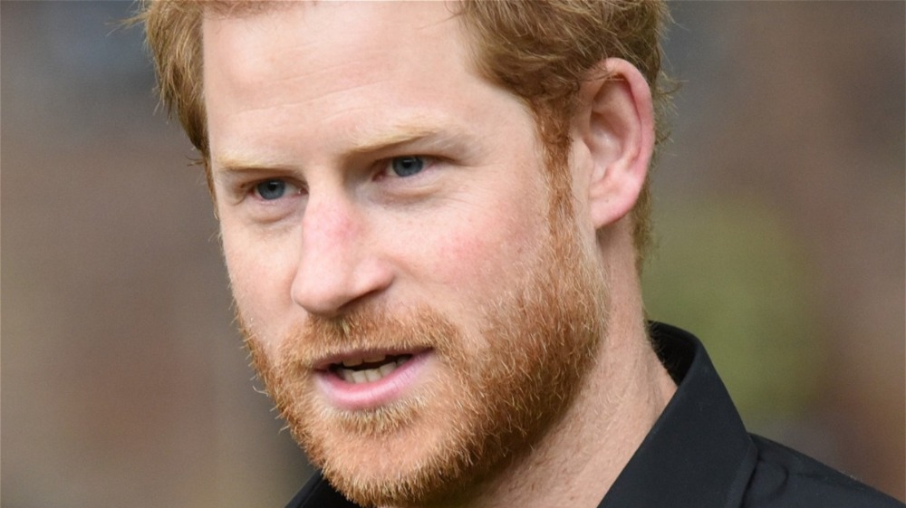 Prince Harry wearing black shirt