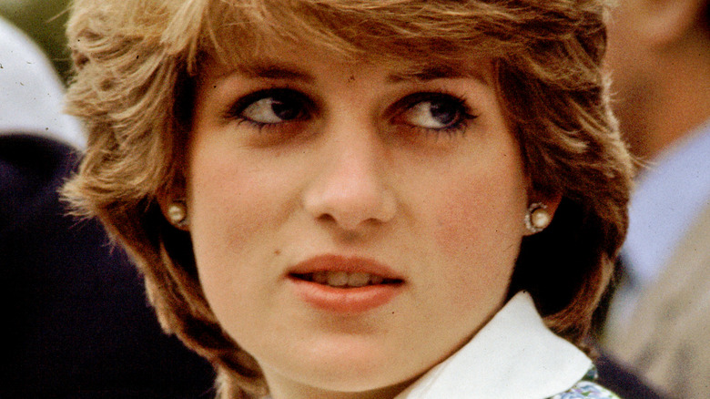 Princess Diana looking away