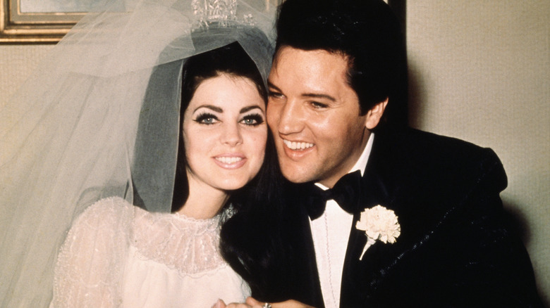 Elvis Presley and Priscilla Presley smiling